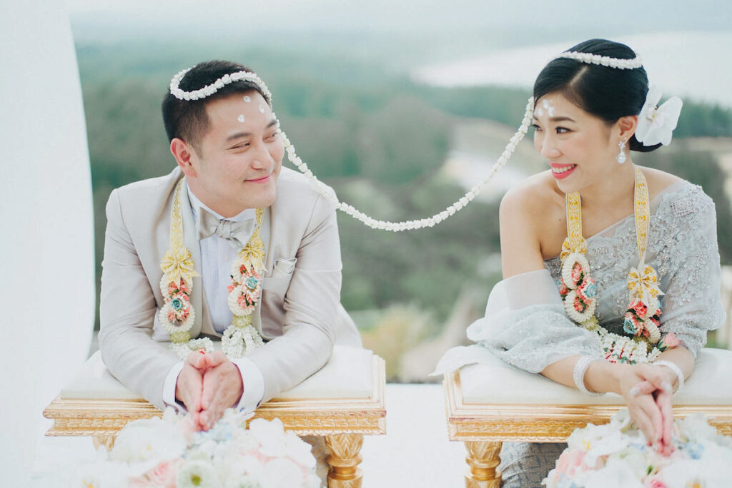 Thai Couple During Sai Monkhon Ceremony