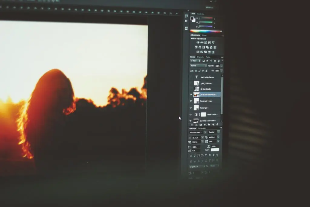 12 Pre-Booking Questions To Ask Your Wedding Photographer Wedding Photographer - Computer Screen Showing Photography Editing