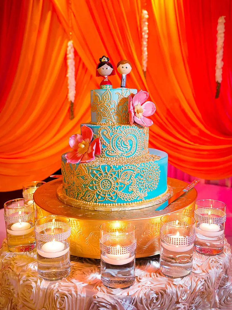 Penguin Wedding Cake Toppers On White Textured Cake