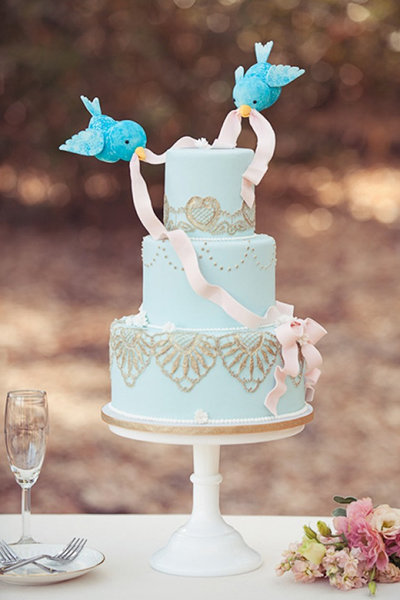 Bluebird Wedding Cake Toppers On Light Blue Cake