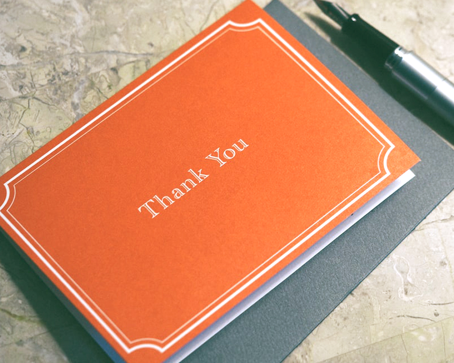 Wedding Hacks To Save You Money And Stress Wedding Hacks - Red Thank You Card With Pen