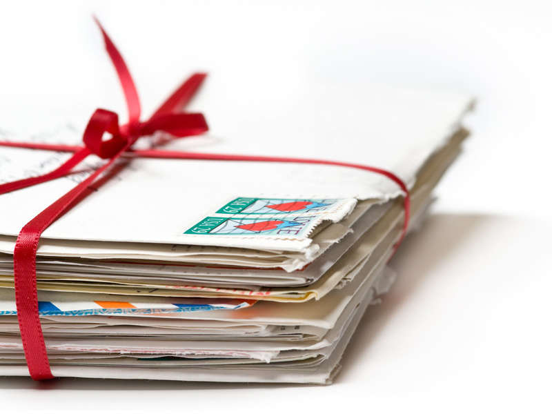 5 Commonly Made Wedding Invitation Mistakes To Avoid Wedding Invitation Mistakes - Stack Of Letters With Red Ribbon
