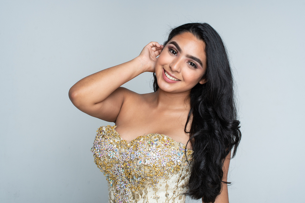 Top 7 Amazing Quinceañera Themes For 2020 Young Women In Gold Quinceanera Dress.