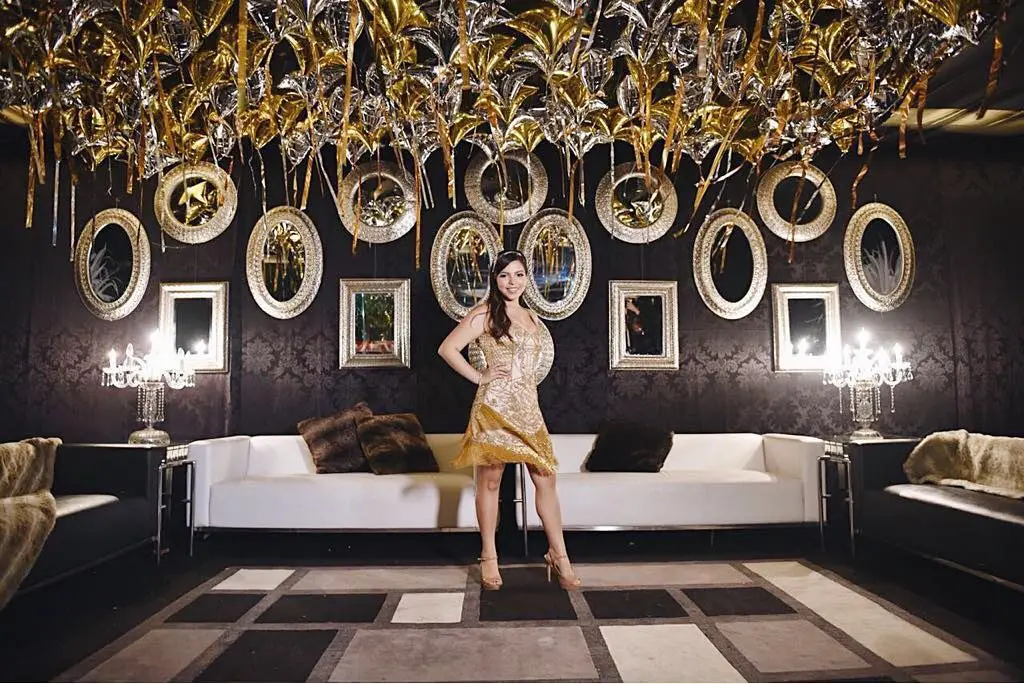 Quinceanera with Great Gatsby themed balloons and dress. 