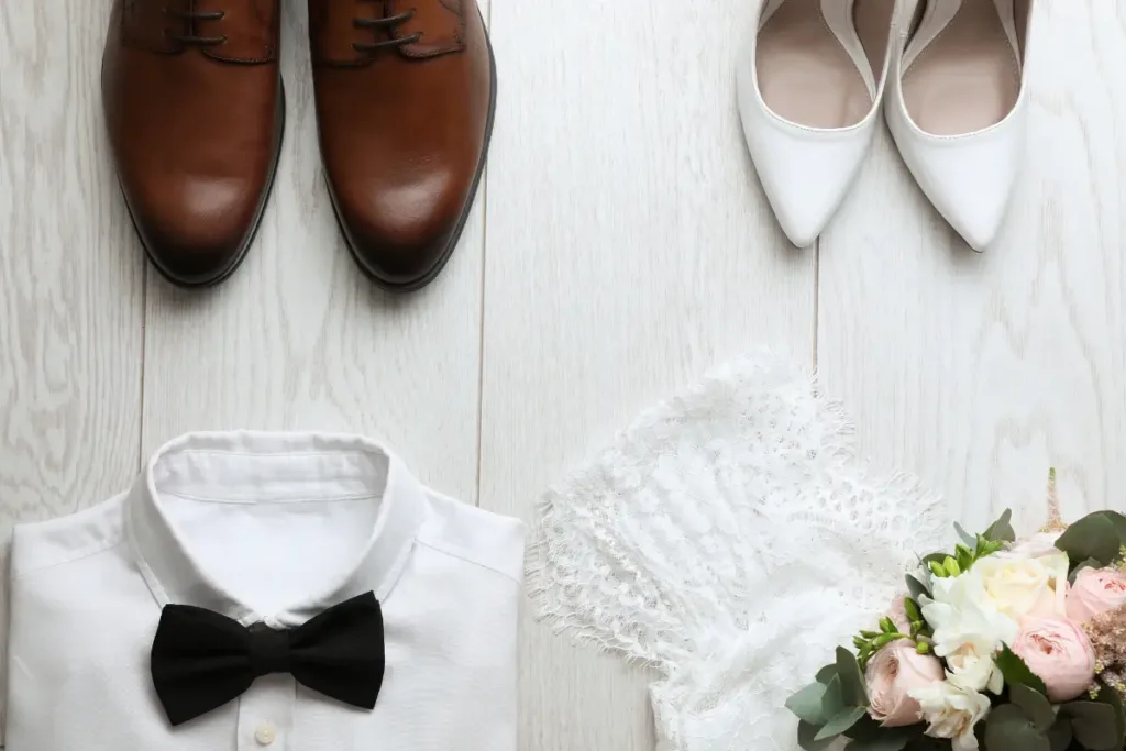Wedding Planning Checklist: How to Plan a Wedding Step by Step Without Missing Anything Wedding shoes, dress details, and accessories arranged neatly as part of early wedding preparation.