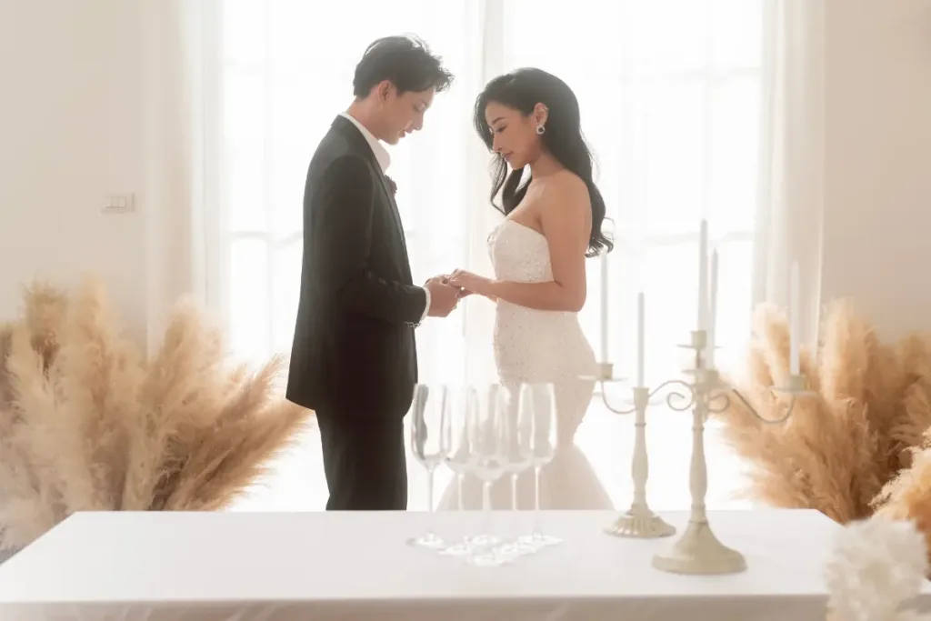 Wedding Aesthetic: How to Choose a Style That Shapes the Entire Experience Intimate ceremony moment showcasing a minimalist wedding aesthetic with soft lighting, neutral colors, and clean spatial design